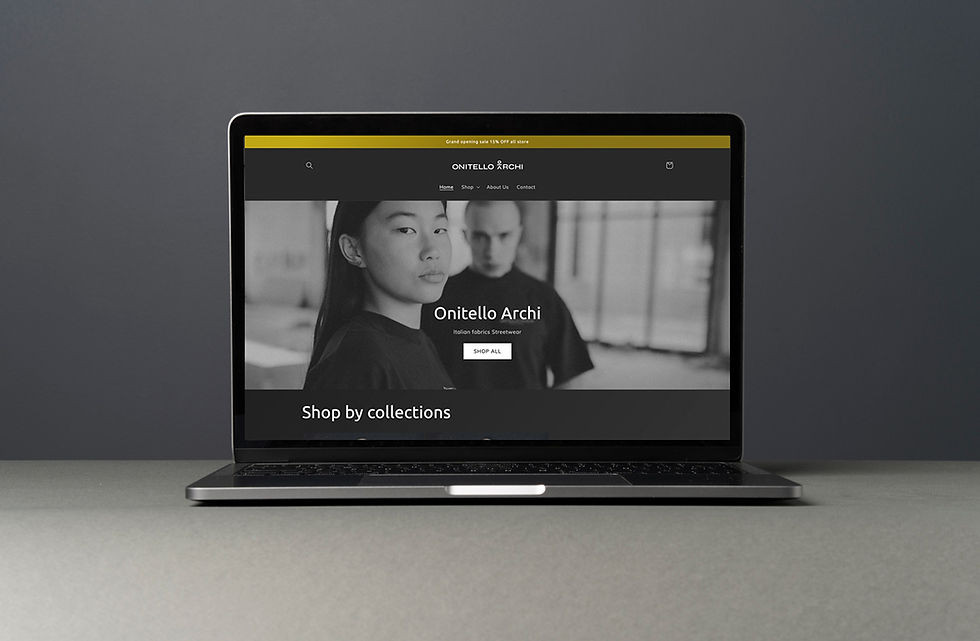 Onitello Archi fashion website shown on a laptop